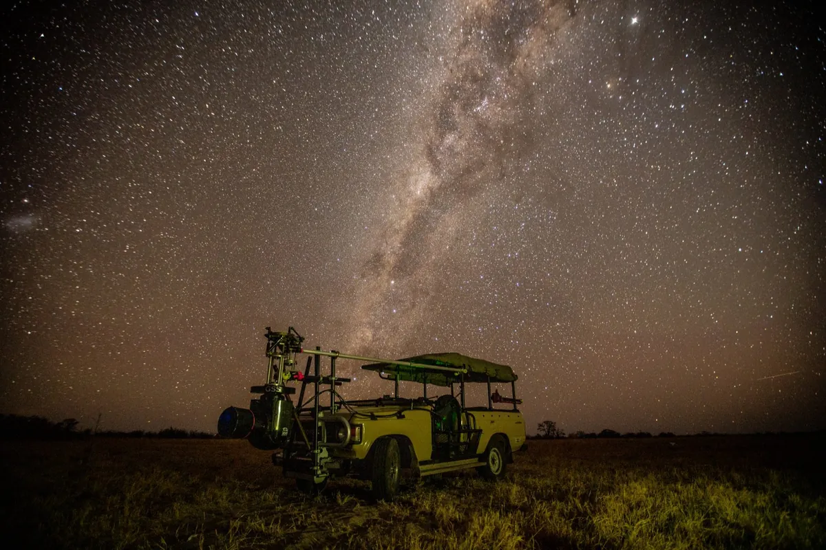 The Milky Way over a safari vehicle